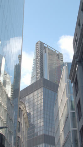 Vertical-Video-Showing-Exterior-Of-The-Cheesegrater-And-Modern-Office-Buildings-In-City-Of-London-UK-1